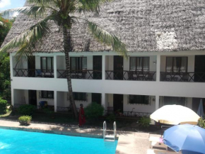 Отель Papillon Beach Apartments  Bamburi